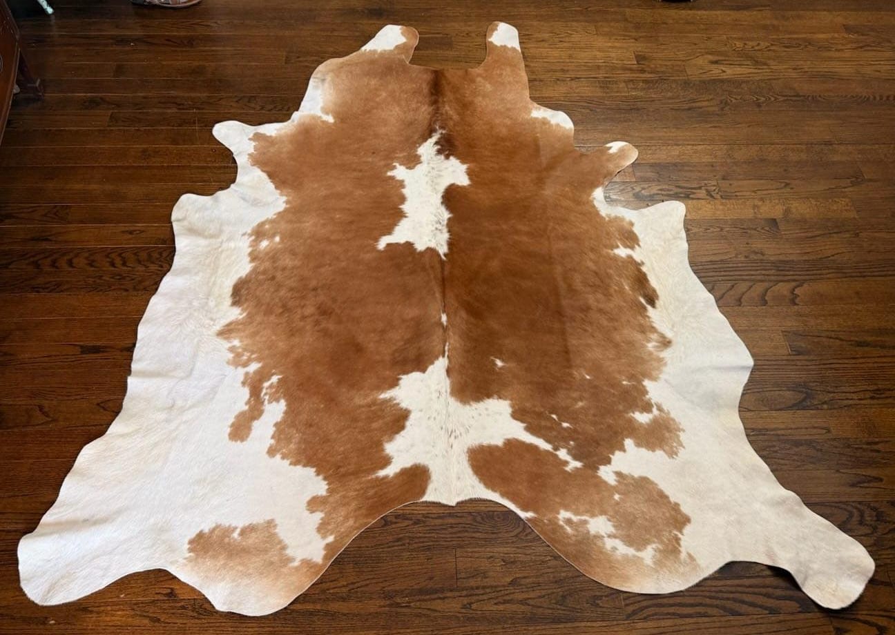 Tan and White Cowhide Rental