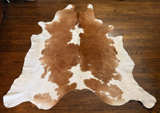 Tan and White Cowhide Rental